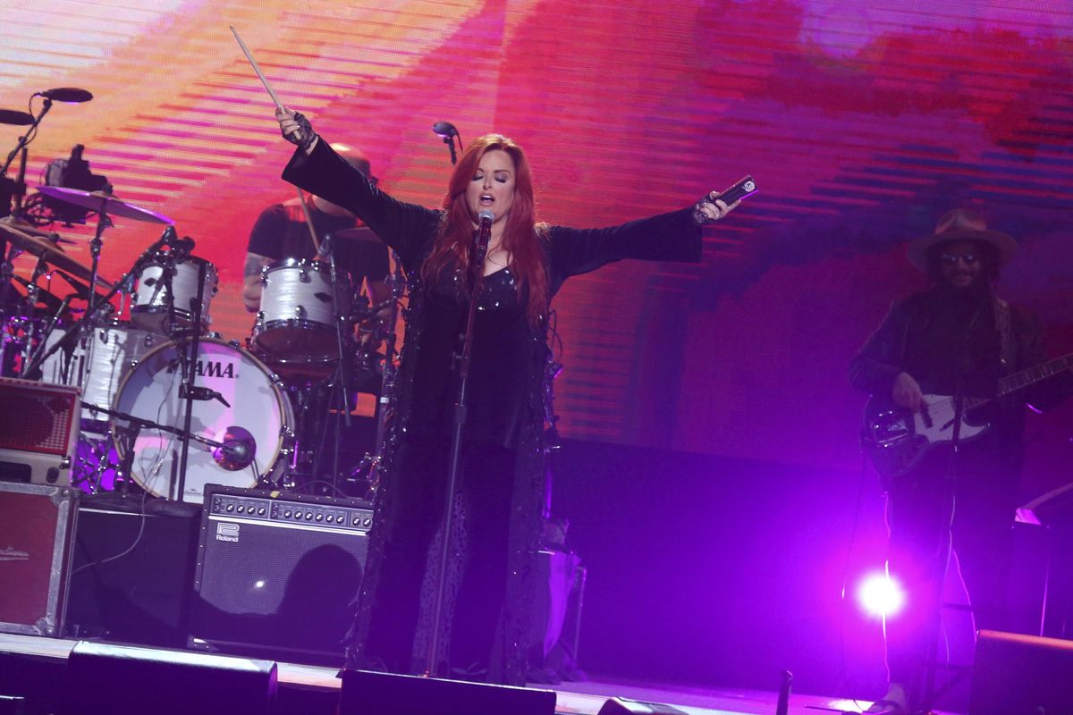 Wynonna Judd performs during the “All In for the Gambler: Kenny Rogers’ Farewell Concert Celebration” at Bridgestone Arena on Oct. 25, 2017, in Nashville, Tennessee. (Laura Roberts / Invision/AP)
