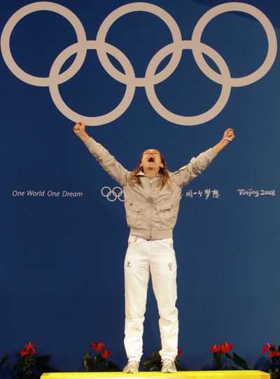 Valentina Vezzali, of Italy, celebrates her gold medal in fencing on Monday in Beijing.  (Associated Press / The Spokesman-Review)
