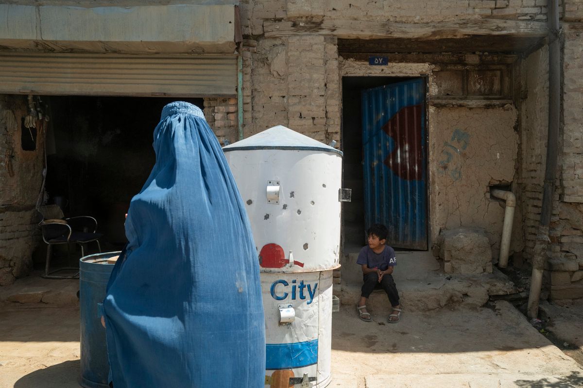 Many working-age men in Afghanistan are dead or disabled, but women, like this one photographed in a burqa in June, are increasingly unable to find employment under the Taliban. MUST CREDIT: Carolyn Van Houten/The Washington Post (Carolyn Van Houten/The Washington Post)
