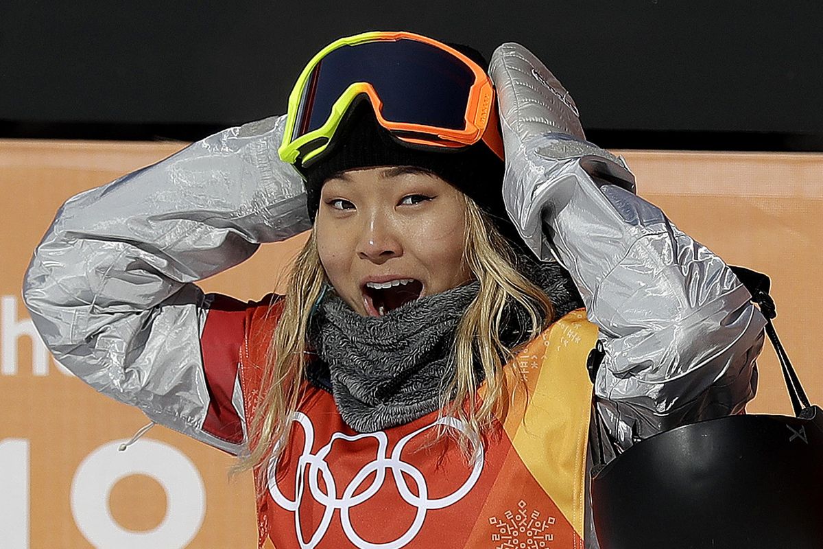Chloe Kim, of the United States, reacts to her score during the women
