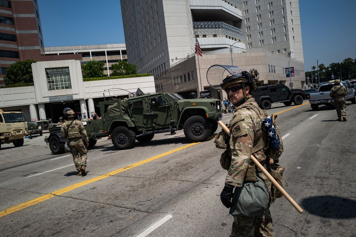 National Guard troops and law enforcement officers in Los Angeles in June.  (Salwan Georges/The Washington Post)