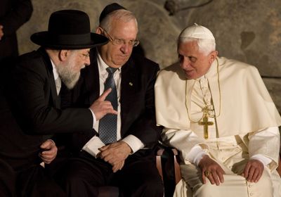 Pope Benedict XVI talks with  Meir Lau,  chairman of Yad Vashem and chief rabbi of Tel Aviv, left, and Knesset Speaker Reuven Rivlin  at the Yad Vashem Holocaust memorial  on Monday.  (Associated Press / The Spokesman-Review)