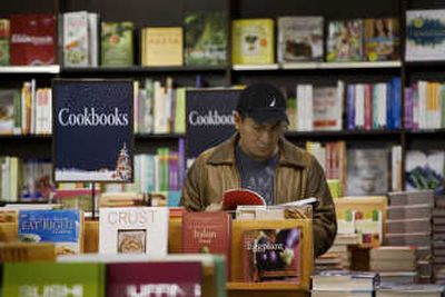 
Cesar Acteopan shops for cookbooks Tuesday at the Union Square Barnes & Noble in New York. Associated Press
 (Associated Press / The Spokesman-Review)