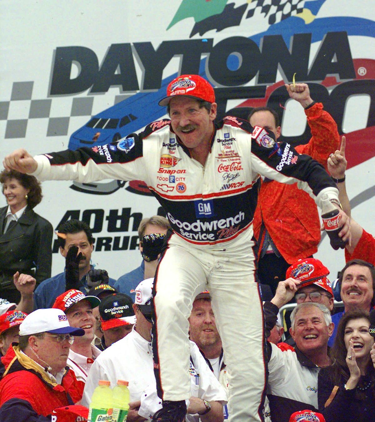 In this Feb. 15, 1998, file photo, Dale Earnhardt smiles in Victory Lane after winning the NASCAR Daytona 500 auto race at Daytona International Speedway in Daytona Beach, Fla. Earnhardt had lost 14 times driving the famed No. 3 car for Richard Childress Racing, and both men desperately wanted to avoid more heartache. It all changed on Feb. 15, 1998. At 46, Earnhardt was the sentimental choice and, at last, won “The Great American Race.” It’s a NASCAR moment that has stood the test of time. It included a lucky penny and a pit-road processional never before seen in auto racing. (Chris O’Meara / Associated Press)