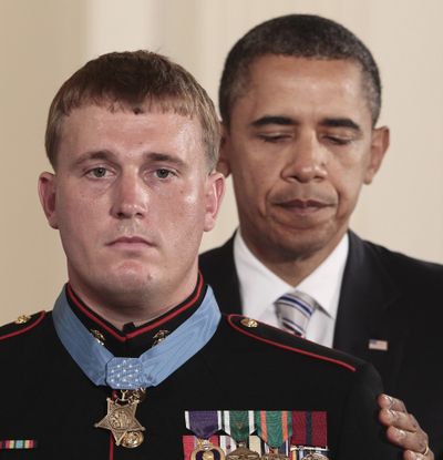 In this Sept. 15 file photo, President Barack Obama awards the Medal of Honor to former Marine Corps Cpl. Dakota Meyer, 23, from Greensburg, Ky., during a ceremony in the East Room of the White House in Washington, D.C.  (Pablo Monsivais / Associated Press)