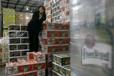Betty Buck, President of Buck Distributing, poses for a photo in the warehouse of her beer distribution business in Upper Marlboro, Md., on Monday.