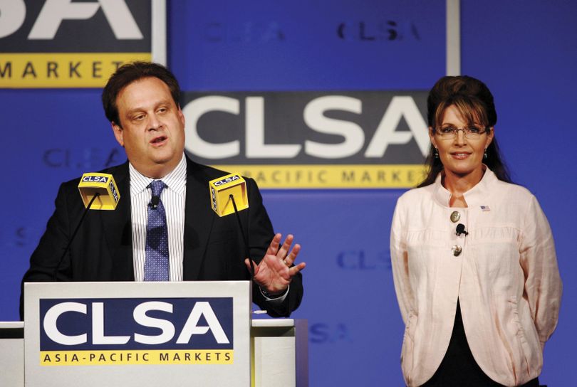 ORG XMIT: XKC803 In this photo released by brokerage and investment group CLSA Asia-Pacific Markets, CLSA CEO Jonathan Slone, left, speaks as former U.S. vice presidential nominee Sarah Palin listens during the 16th annual CLSA Investors' Forum in Hong Kong Wednesday, Sept. 23, 2009. Palin, criticized for her lack of foreign policy experience, was emerging in Asia on Wednesday to give a speech that could boost her credentials for a possible bid for the presidency in 2012. (AP Photo/CLSA Asia-Pacific Markets, Jeff Topping) ** NO SALES NO ARCHIVES ** (Jeff Topping / The Spokesman-Review)