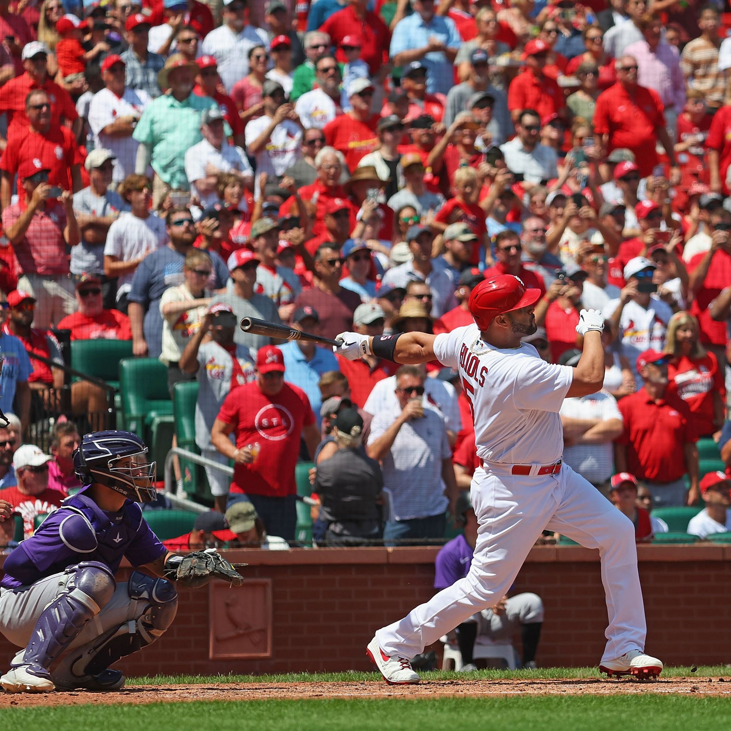 St. Louis Cardinals slugger Albert Pujols 'chases' baseball