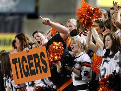 
Lewis and Clark fans cheer on their team before the start of the fourth quarter Saturday during the 4A state championship football game in Tacoma. Special to the Spokesman-Review
 (Patrick Hagerty Special to the Spokesman-Review / The Spokesman-Review)