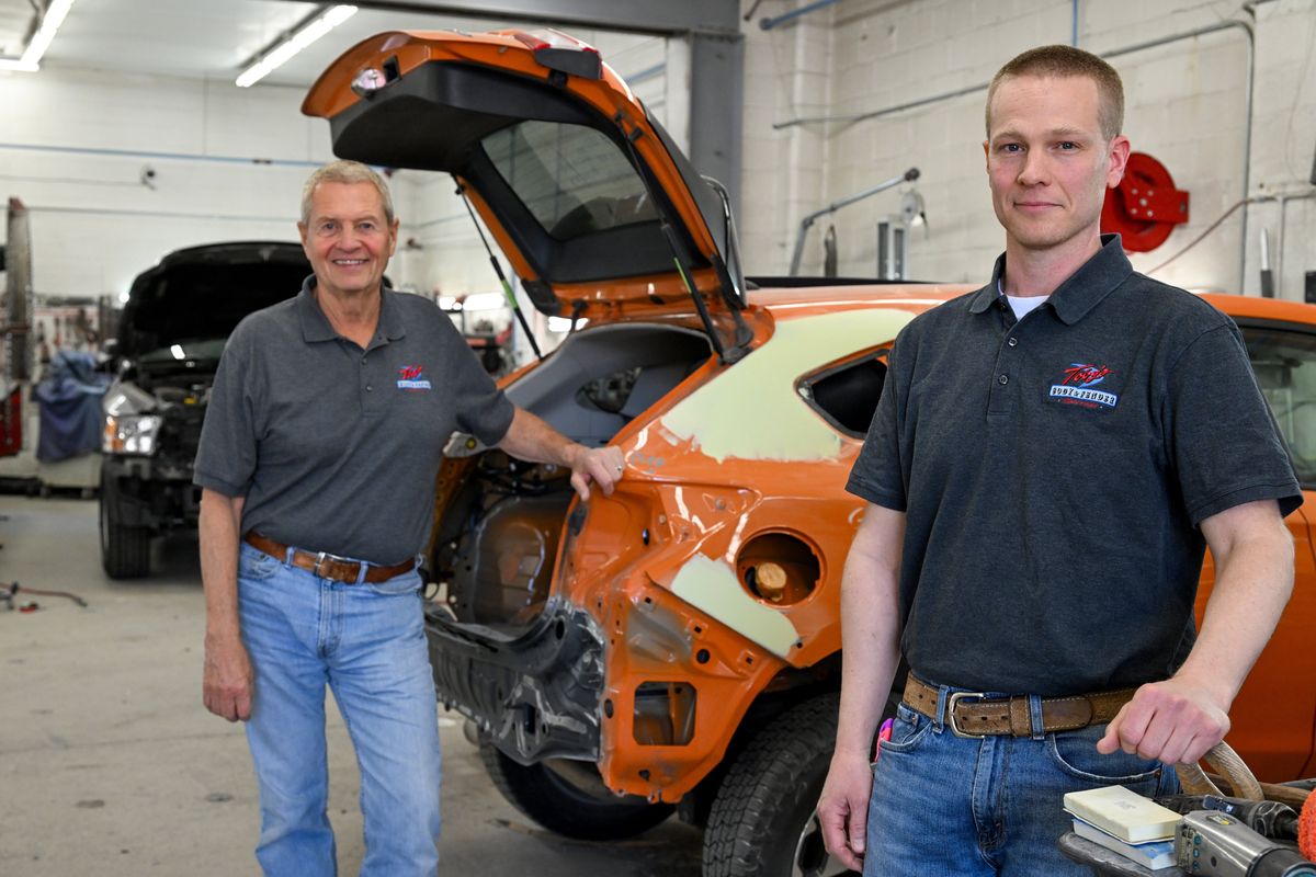 Bob Tobiason, left, sold Toby’s Body and Fender to his son Keith Tobiason in 2017. Though Bob is retired, he still comes to the shop to help out. The shop was started by Bob’s father Clyde in 1945. (Jesse Tinsley/THE SPOKESMAN-REVIEW)