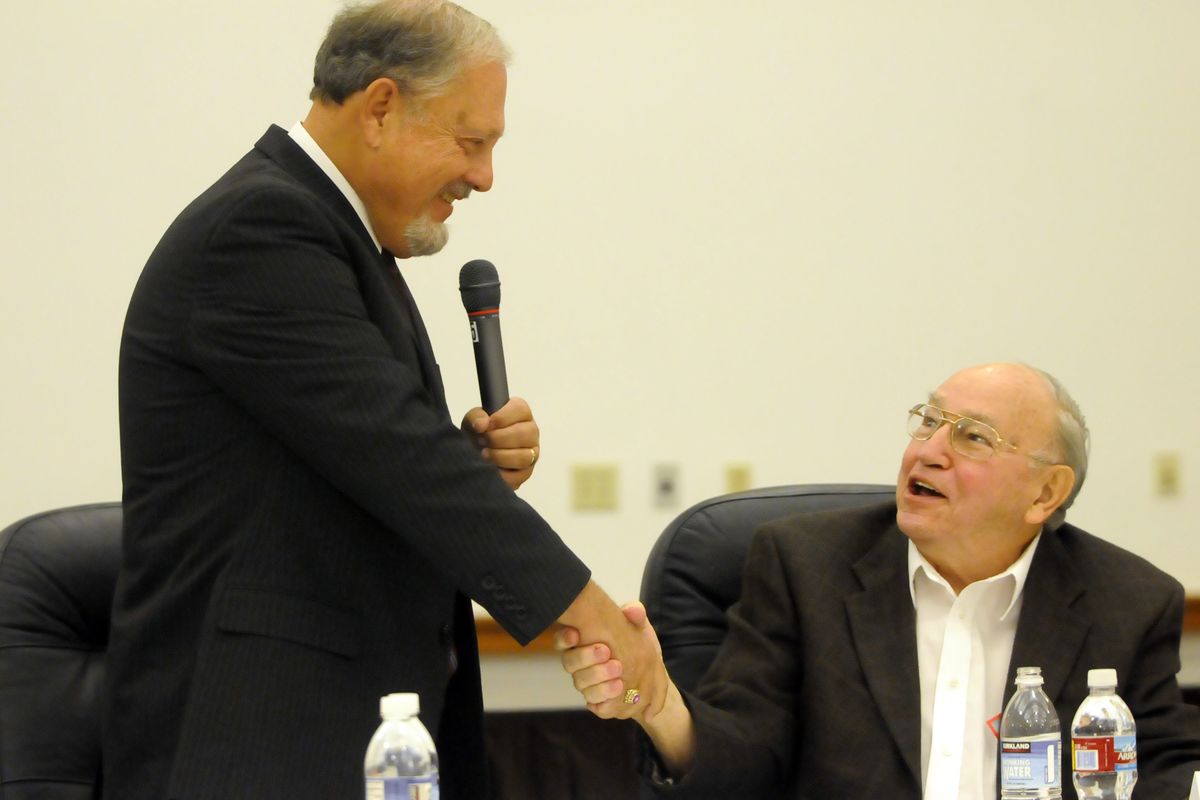 Spokane Valley Mayor Rich Munson, left, shares a light moment with challenger Bob McCaslin, right, at a candidates’ forum sponsored by the Chamber of Commerce Wednesday at CenterPlace Regional Event Center. Munson had just said that he has always voted for McCaslin in state legislature elections, but won’t be voting for him this year. (Jesse Tinsley / The Spokesman-Review)