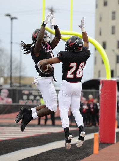 Eastern Washington back Antoine Custer Jr. (28) and wide receiver Jayson Williams  celebrate a touchdown against Portland State in the first half Saturday, Nov. 23, 2019, in Cheney. (James Snook / For The Spokesman-Review)