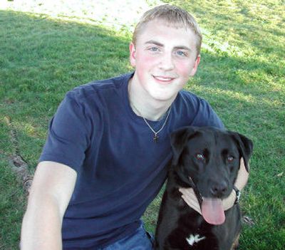 
Seth Packwood, 17, a senior at University High School, recently attended the National Youth Leadership Workshop in Washington, D.C.  He is photographed with his dog, Bo. 
 (JENNIFER LARUE / The Spokesman-Review)