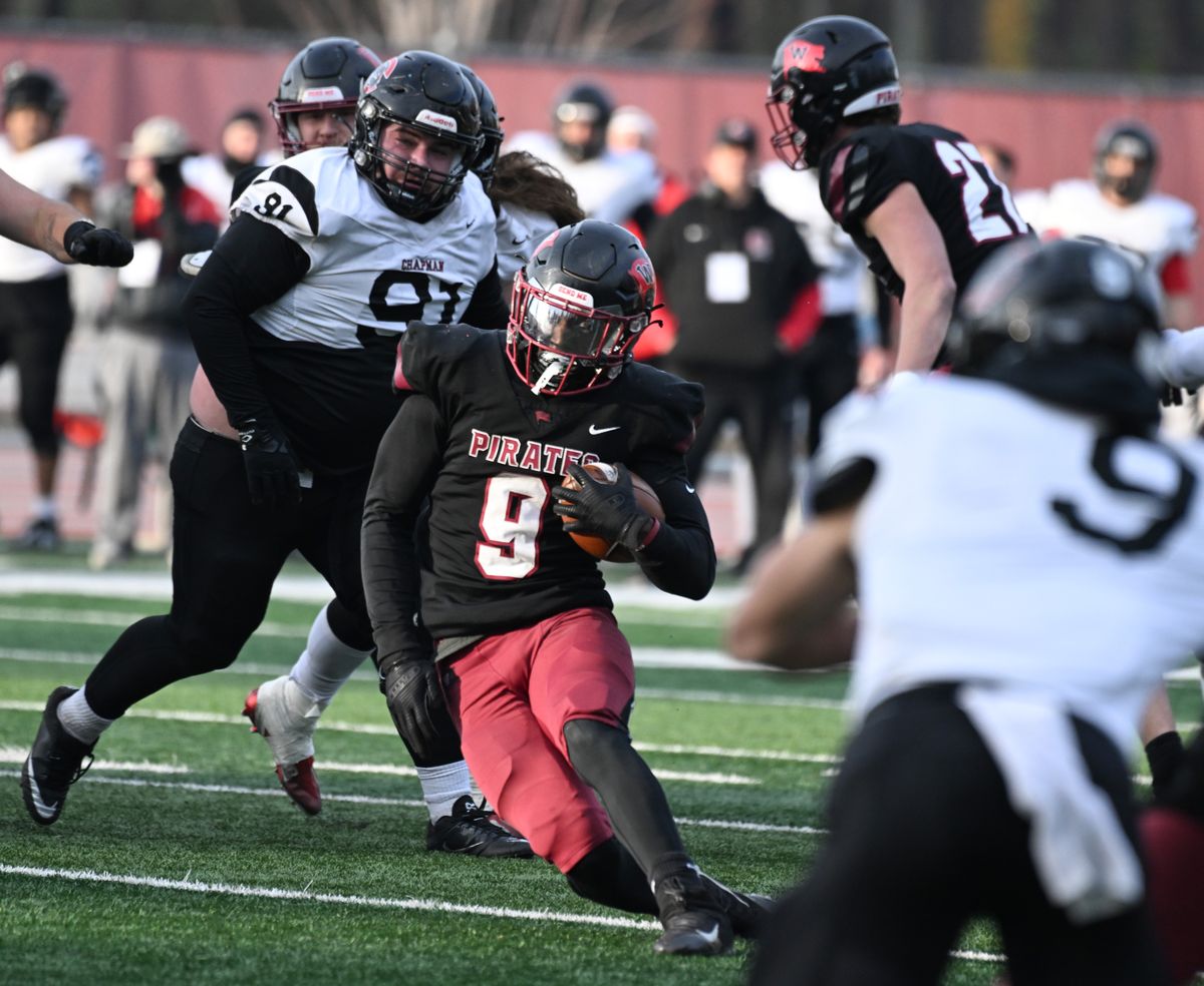 Whitworth wide receiver Solo Hines (9) zags between the Chapman Panthers defense Saturday, Nov. 18, 2023 at the Pine Bowl at Whitworth University. The Pirates won 42-28 against the Panthers.  (Jesse Tinsley/THE SPOKESMAN-REVIEW)