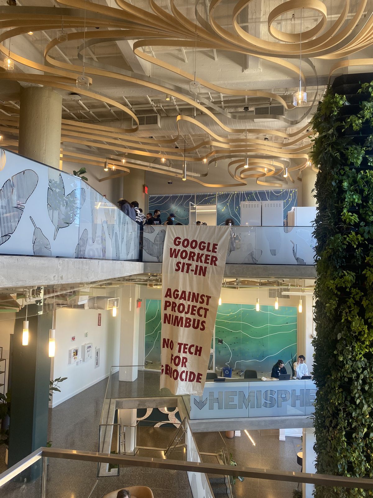 A banner hangs during the sit-in at Google’s New York office.  (No Tech for Apartheid/TNS/TNS)