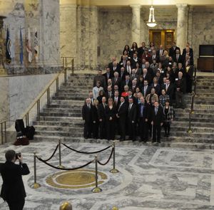OLYMPIA-- Members of the Spokane lobbying "Fly-In, pose for a group picture on the Capitol steps leading to the Senate Chambers (Jim Camden)