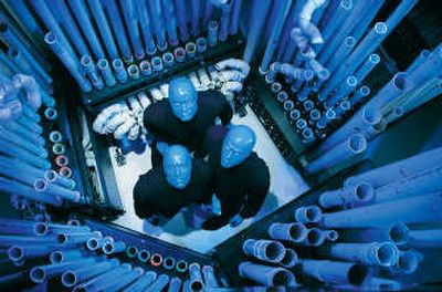 
The Blue Man Group sometimes performs along with its eight-piece rock band, using instruments such as PVC pipe and various drumming surfaces.
 (Photos courtesy of Lobeline Communications / The Spokesman-Review)