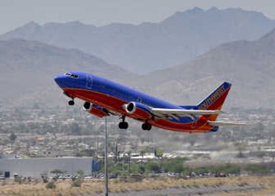 
A Southwest Airlines jet takes off in Phoenix. Southwest Airlines says it grounded 43  planes for structural inspections.Associated Press
 (File Associated Press / The Spokesman-Review)