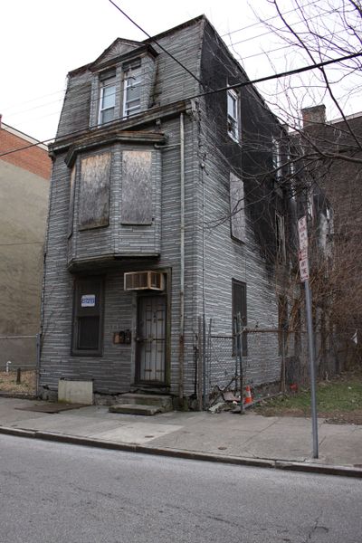 Here’s an old inner-city house that might be a flipping candidate. It might also be better put into a landfill. (Tim Carter)