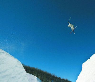 
A slopestyle skier spans a 40-foot gap in Winter X Games warm-ups near Aspen. Physicians warn average skiers that these tricks could be hazardous to health. 
 (Associated Press / The Spokesman-Review)