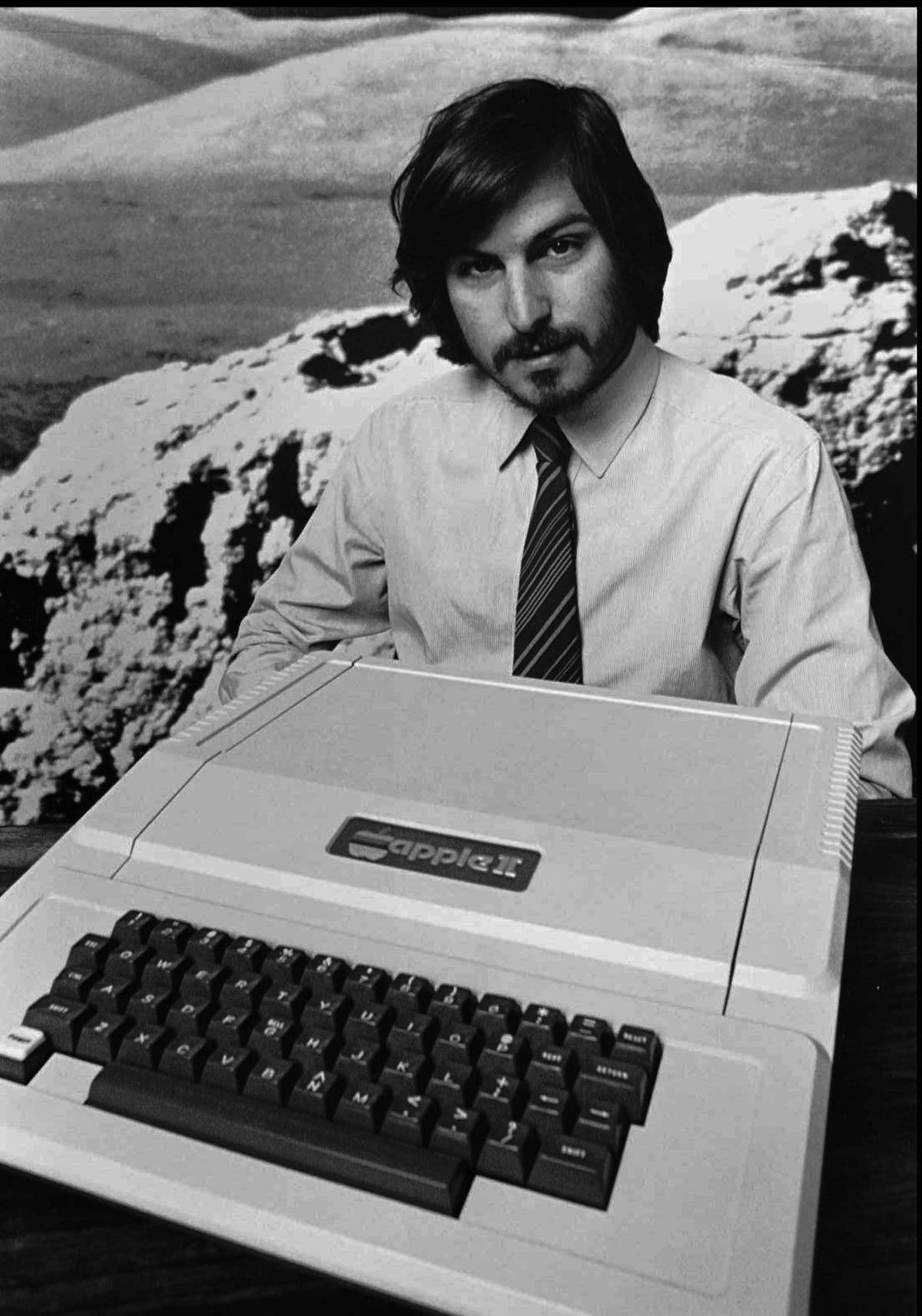 This 1977 file photo shows Apple Computer Inc. founder Steve Jobs as he introduces the new Apple II computer in Cupertino, Calif. (Apple Computers Inc)