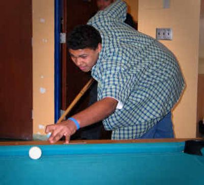
Daniel Anderson, 15, plays a game of pool at the Boys and Girls Club of Spokane County. He has been named the 2005 Youth of the Year for the club.
 (Kandis Carper / The Spokesman-Review)
