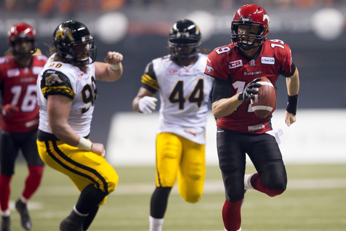 Calgary Stampeders quarterback Bo Levi Mitchell runs for a first down. (Associated Press)