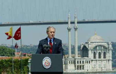 
U.S. President Bush speaks at Galatasaray University in Istanbul on Tuesday. Bush, standing at the historic Bosporus waterway that separates Europe and Asia, defended his push for Middle East democracy. 
 (Associated Press / The Spokesman-Review)
