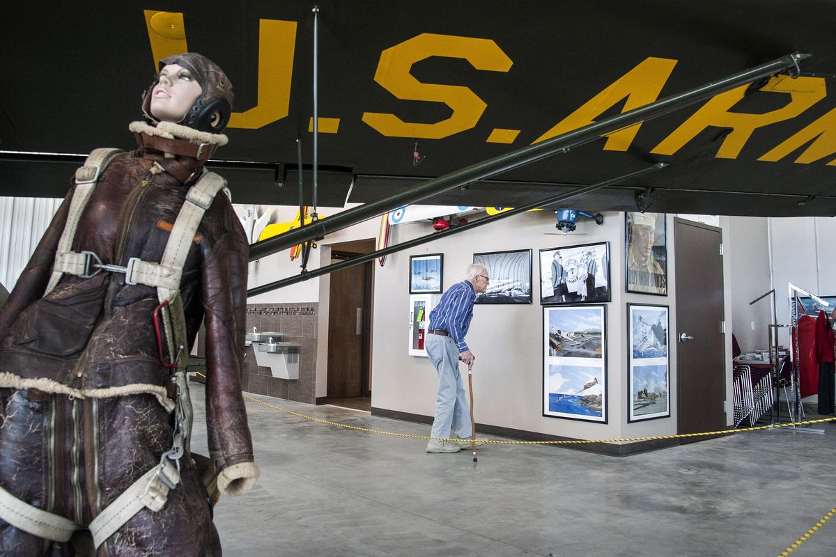 George White, 97, pays a visit to the new Honor Point Military & Aerospace Museum, July 15, 2016. White was an employee for Northwest Airlines for 23 years. A Women Airforce Service Pilots (WASP) display is at left. (Dan Pelle / The Spokesman-Review)