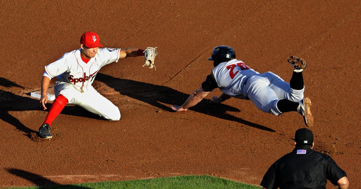 Volcanoes’ Tyler Horan steals second before Evan Van Hoosier can make tag in first inning. Horan hit the winning homer in eighth inning. (Kathy Plonka)