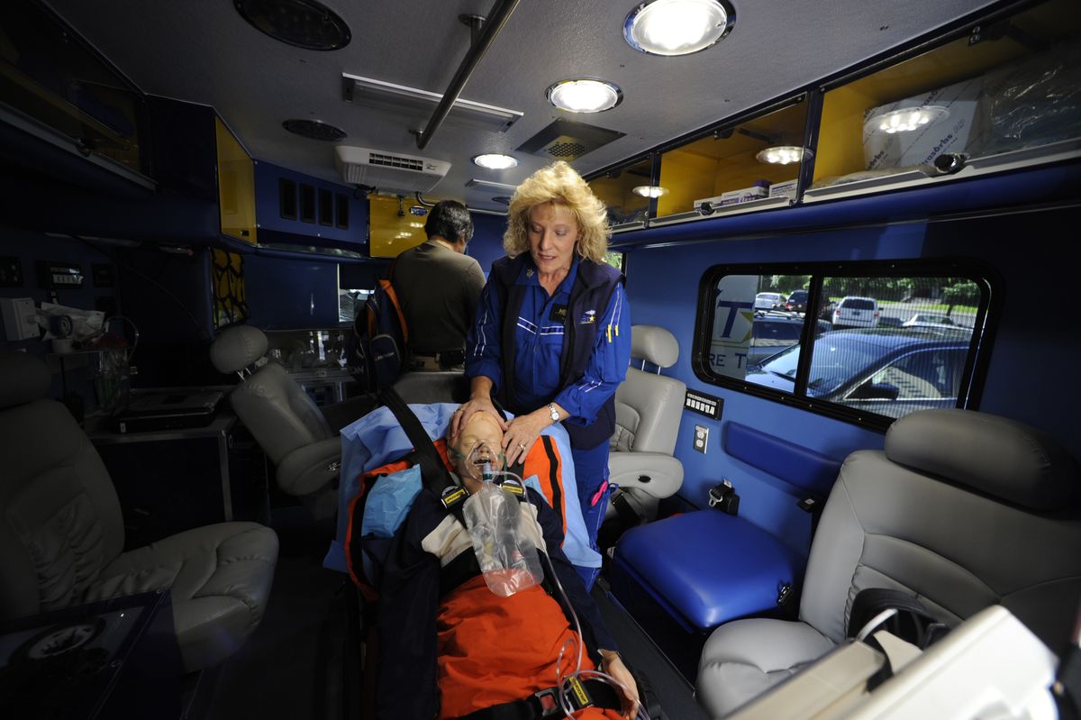 MedStar nurse Terri Tickner, holding a mannequin for demonstration purposes, talks about the features on the new MedStar children’s ambulance Tuesday at Providence Sacred Heart Medical Center & Children’s Hospital. One feature is oxygen supply for newborns. (Jesse Tinsley / The Spokesman-Review)