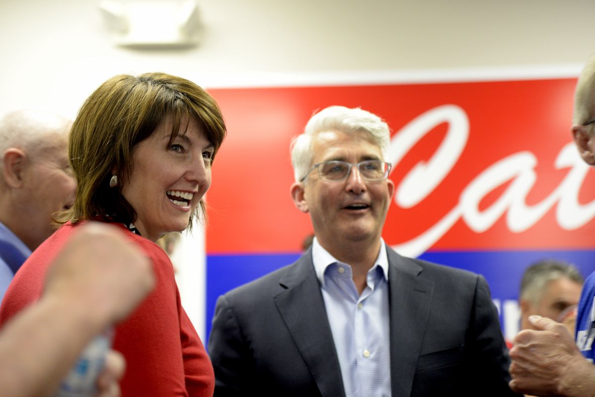 Cathy McMorris Rodgers and Bill Bryant watch the returns in the primary election at McMorris Rodgers' headquarters in Spokane, Tuesday, Aug. 2, 2016. (Jesse Tinsley / The Spokesman-Review)
