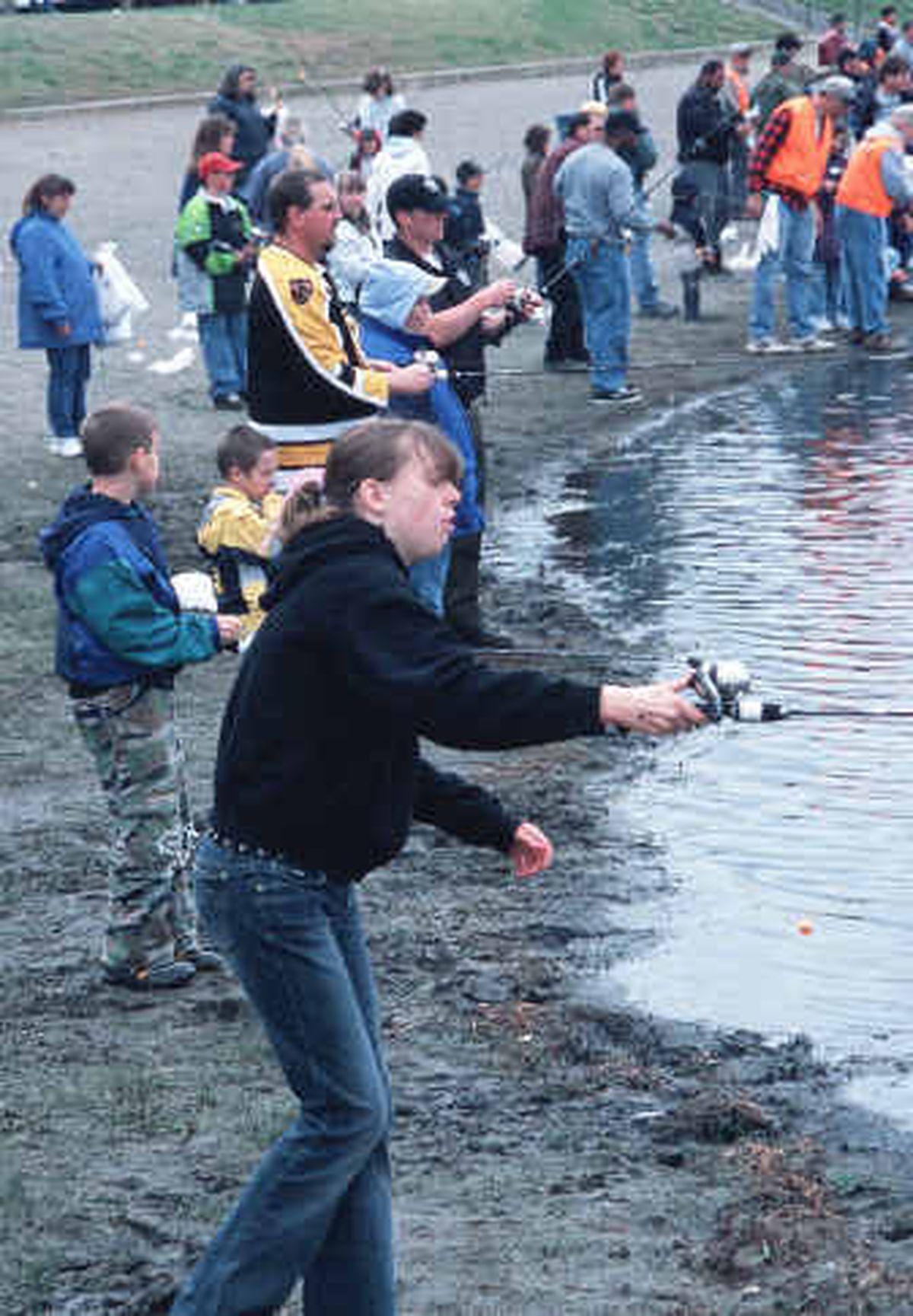 
With the help of 60 volunteers, about 1,000 kids got a taste of catching trout at Clear Lake on May 7 as they cast into net pens holding 7,000 hatchery rainbows.
 (The Spokesman-Review)