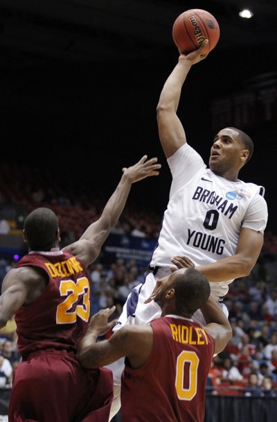 BYU battles back: Brandon Davies, top, and teammate Noah Hartsock combined for 41 points and 20 rebounds as Brigham Young erased a 25-point deficit in first-round win over Iona. In another opener, Western Kentucky came back from a 16-point hole to beat Mississippi Valley St. by one. More postseason coverage, B3/5. (Associated Press)