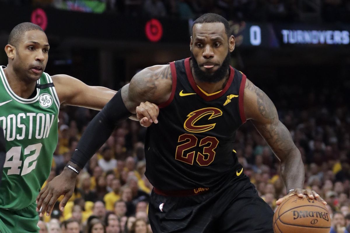 Cleveland Cavaliers’ LeBron James (23) drives past Boston Celtics’ Al Horford (42), from Dominican Republic, in the first half of Game 4 of the NBA basketball Eastern Conference finals, Monday, May 21, 2018, in Cleveland. (Tony Dejak / Associated Press)