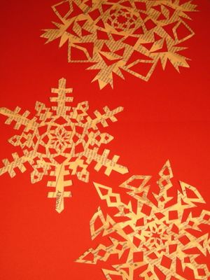 Paper snowflakes are each just as unique as the snowflakes falling outside.  (Maggie Bullock)
