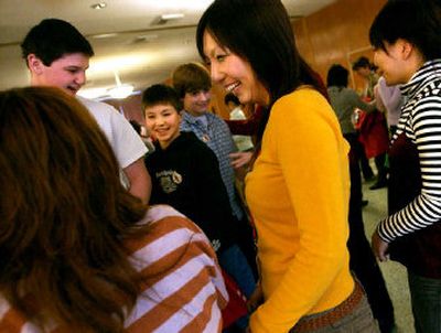 
Yuna Kawakami, a student at Mukogawa Fort Wright Institute, laughs with a friend as they meet students from Sandpoint. 
 (Kathryn Stevens / The Spokesman-Review)