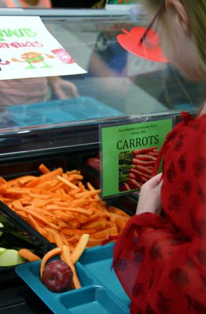 Children at Grant Elementary in Spokane's lower South Hill got a taste of Washington grown food from Othello and Cheney, Wash. on Wednesday's salad bar. (Lorie Hutson)