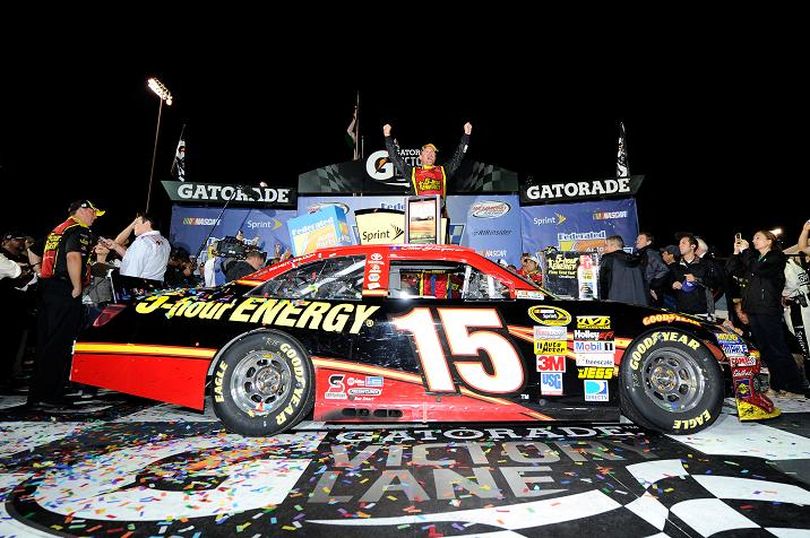 Clint Bowyer, driver of the #15 5-hour Energy Toyota, celebrates in victory lane after winning the NASCAR Sprint Cup Series Federated Auto Parts 400 at Richmond International Raceway on September 8, 2012 in Richmond, Virginia. (Photo Credit: John Harrelson/Getty Images for NASCAR) (John Harrelson / Getty Images North America)