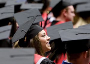 Elizabeth Roberts,  who received a bachelor’s degree in sociology from Washington State University, smiles during graduation ceremonies on Saturday at Beasley Performing Arts Coliseum in Pullman. The Spokesman Review (Photos by TYLER TJOMSLAND The Spokesman Review / The Spokesman-Review)