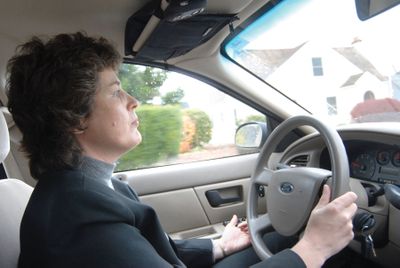 Polly Davin drives from the sheriff’s office to the Grays Harbor Child Advocacy Center in Montesano, Wash., where as a sheriff’s deputy she interviews families and children when investigating abuse.  (Associated Press / The Spokesman-Review)