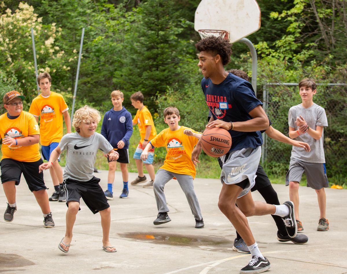 Gonzaga University men's basketball player Jeremy Jones makes a drive for the basket during a game at YMCA Camp Reed on July 10. 2018. Jones was chased by everyone on his hoop, as egged on by fellow Zag Zach Norvell Jr., during a late afternoon rotation at Camp Goodtimes. (Libby Kamrowski / The Spokesman-Review)