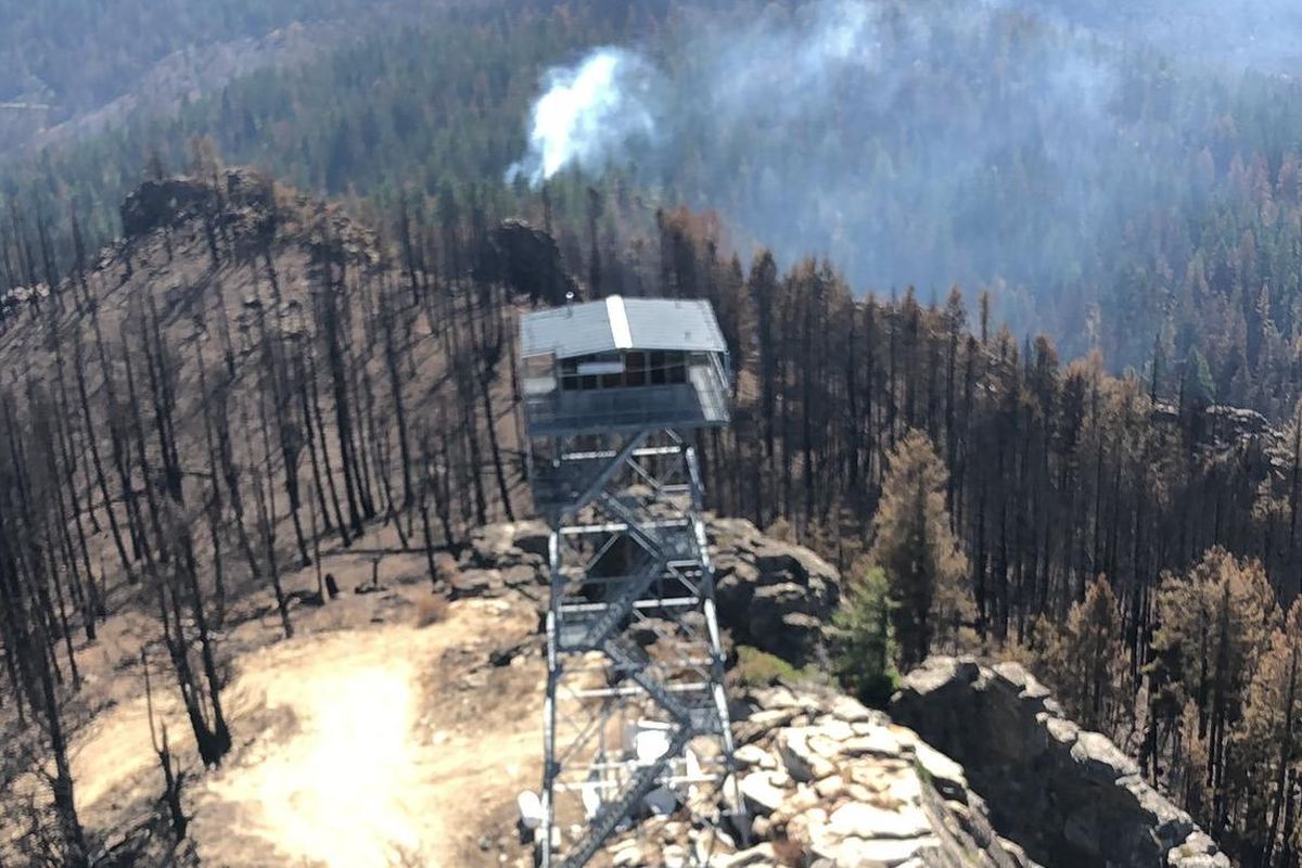 Air crews fly around the Whitestone Lookout at the northern edge of the Williams Flats Fire on Tuesday. (Courtesy of Jeff Sevigney)