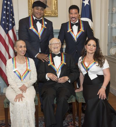 Front row from left, 2017 Kennedy Center Honorees Carmen de Lavallade, Norman Lear, and Gloria Estefan, back row from left, LL Cool J, and Lionel Richie are photographed following the State Department dinner for the Kennedy Center Honors on Dec. 2. (Kevin Wolf / Associated Press)