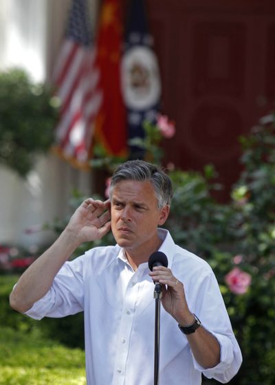 U.S. Ambassador to China Jon Huntsman meets with reporters Saturday at his residence in Beijing.  (Associated Press / The Spokesman-Review)
