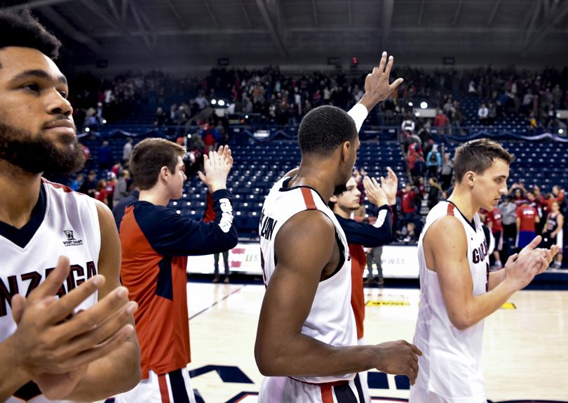 Gonzaga guard Eric McClellan (23) salutes the student section after a college basketball game on Tuesday, Dec 8, 2015, at McCarthey Athletic Center in Spokane, Wash. Gonzaga won the game 61-58. (Tyler Tjomsland / The Spokesman-Review)