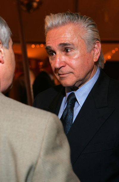 Rep. Maurice Hinchey, D-N.Y., listens to John Hector on Nov. 23, 2005, in Kingston, N.Y., after Hinchey addressed a meeting sponsored by the local Rotary club. (JIM MCKNIGHT / Associated Press)