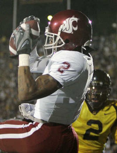 
If Charles Dillon can keep catching touchdown passes and Washington State can win its final three games, a bowl berth could be attained by the Cougars.Associated Press
 (Associated Press / The Spokesman-Review)