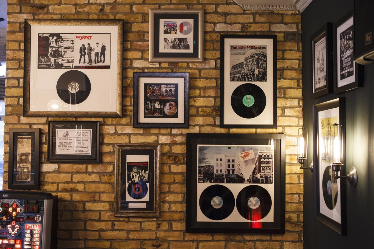 Records, photos and posters hang at the Hope & Anchor pub in London. The Hope & Anchor has a lovely ground-floor pub with a small theater space upstairs and music venue in the basement. (Jonathan Elderfield / AP)