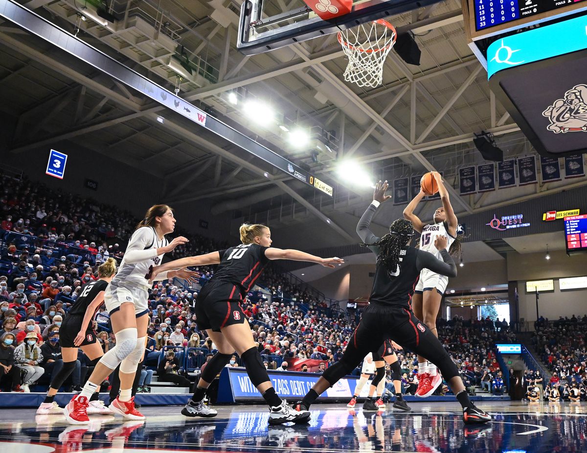 Gonzaga forward Yvonne Ejim (15) takes a shot from the top of the key during the first half of an NCAA college basketball game, Sunday, Nov. 21, 2021, in the McCarthey Athletic Center.  (COLIN MULVANY/THE SPOKESMAN-REVIEW)